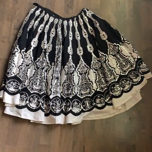 Feel fancy in this Silkland white and black decorative skirt!